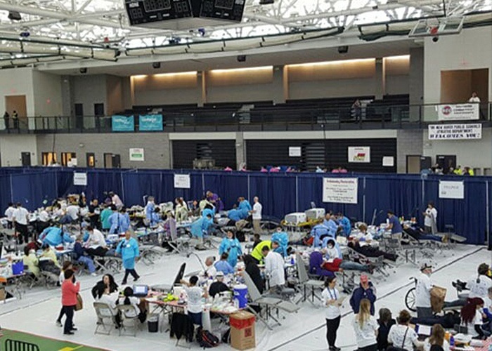 Group of people volunteering together at event