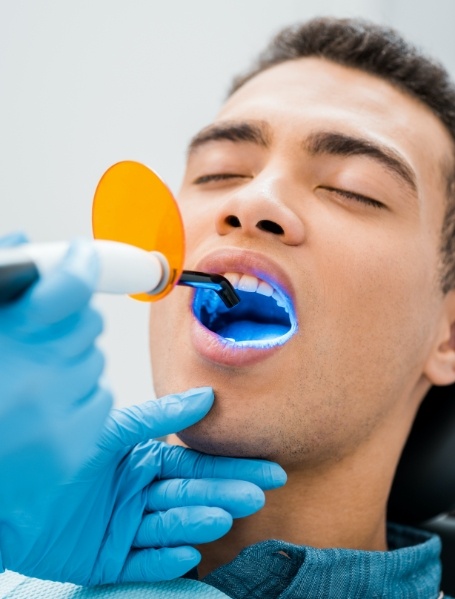 Patient receiving dental bonding