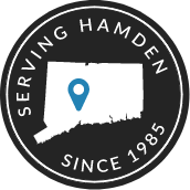 Badge that says Serving Hamden Since 1985
