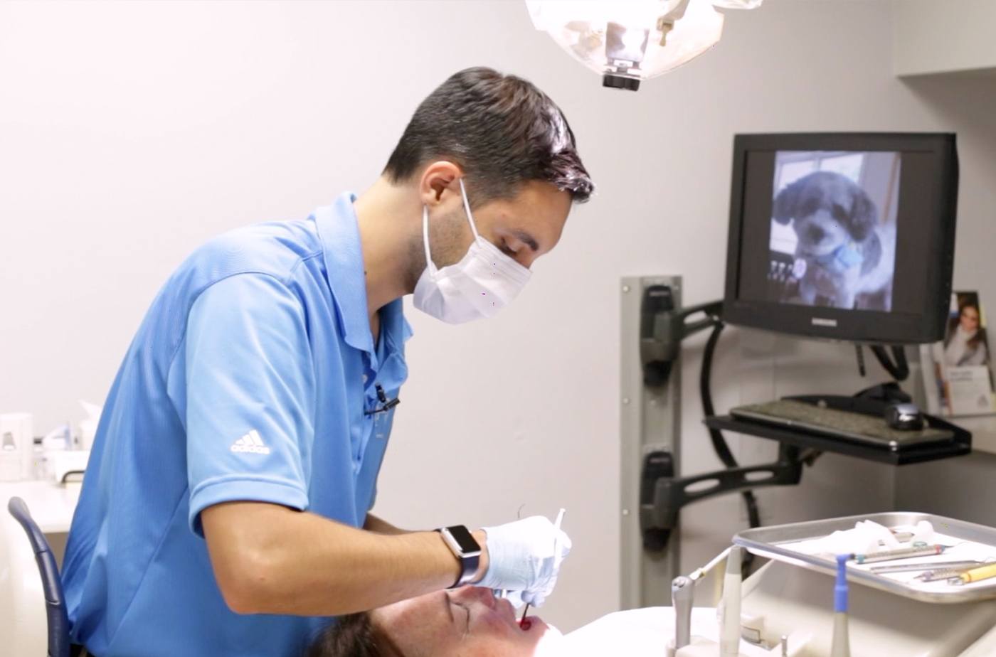 Doctor D'Andrea treating dental patient