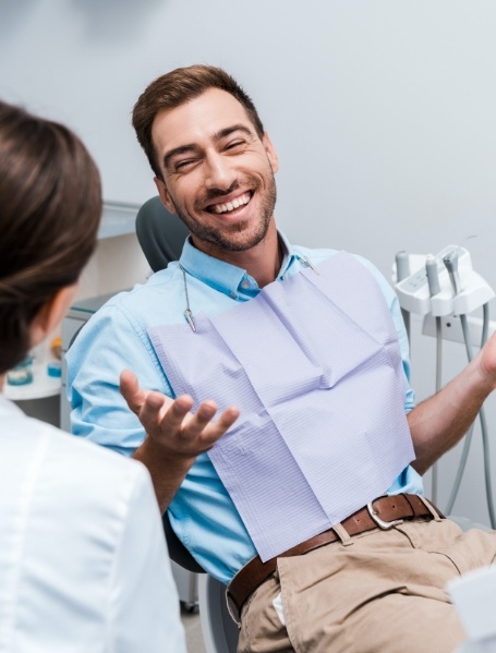 Man smiling during preventive dentistry checkup and teeth cleaning