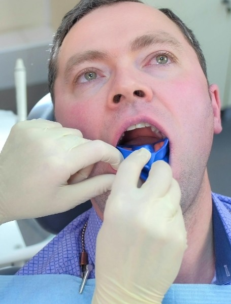 Patient receiving fluoride treatment