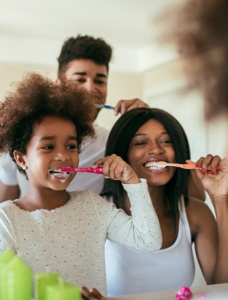 Family using toothpaste and mouthwash together