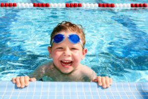 child swimming 