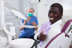 man smiling dentist