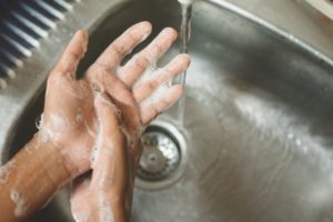 dentist in Hamden washing their hands