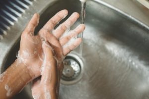 dentist in Hamden washing their hands 