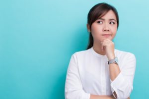 woman thinking about New Year’s resolutions