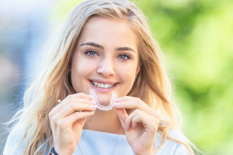 Woman with Invisalign in Hamden