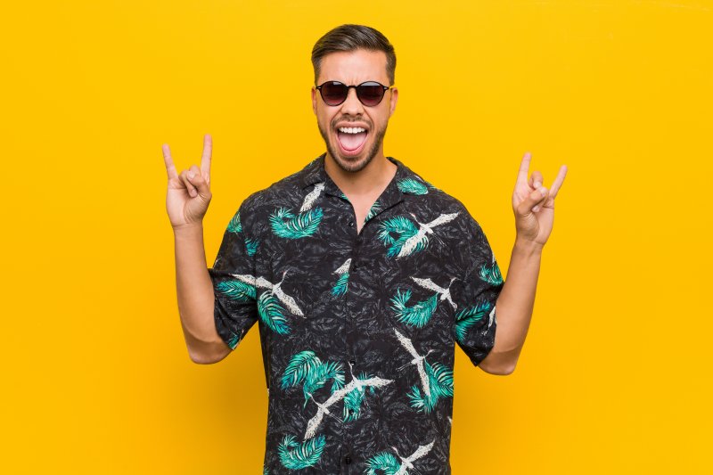 man smiling with bright teeth during summer in Hamden