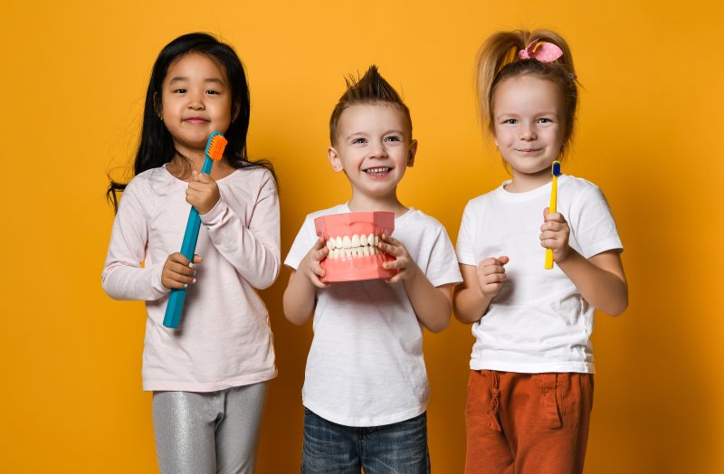 Kids with oral health products