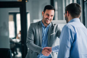 Two businessmen shaking hands