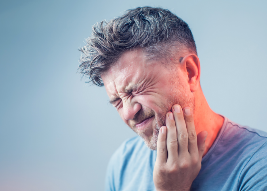 Man holding jaw